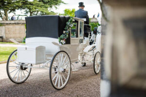 White Glass Fronted Landau with White Horses White Glass Fronted Landau with White Horses