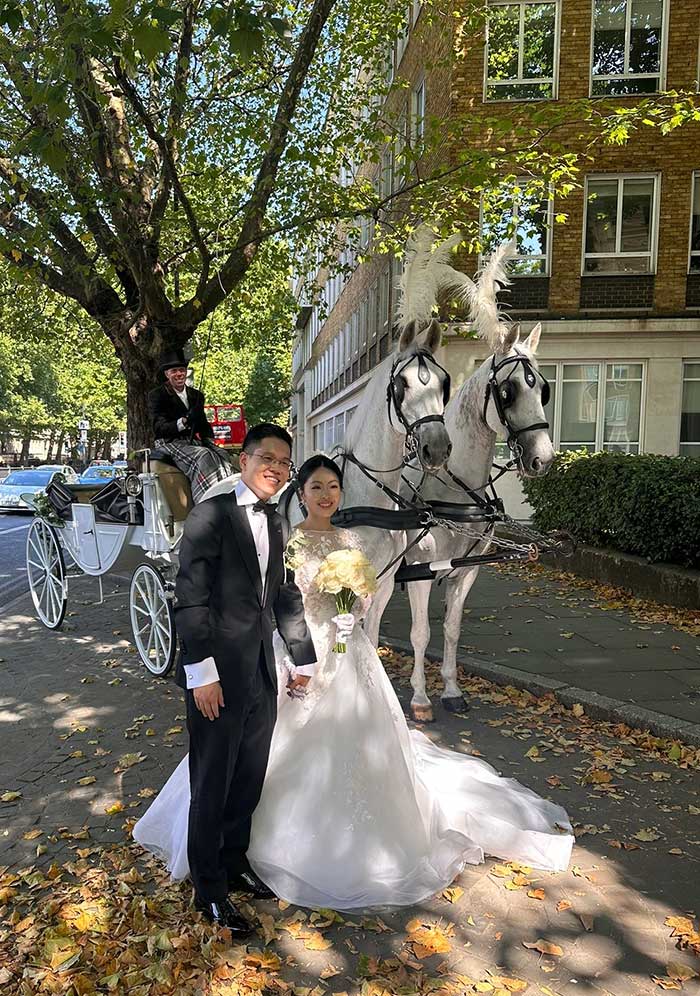 Pair of White Horses with white convertible twin hooded landau with bride Pair of White Horses with white convertible twin hooded landau with bride